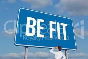 Be fit sign against sky