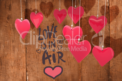 Composite image of love is in the air