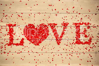 Composite image of love spelled out in petals