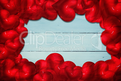 Composite image of red love hearts