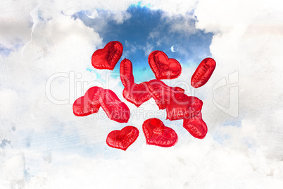 Composite image of heart balloons