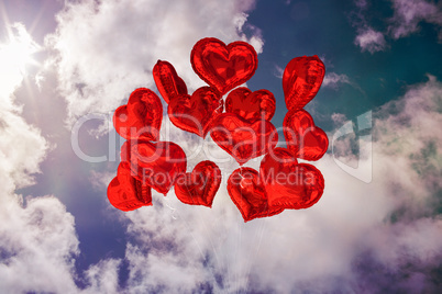 Composite image of heart balloons