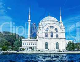 Dolmabahce Mosque on the banks of the Bosphorus, with Istanbul c