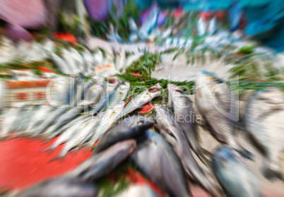 Blurred and zoomed picture of a fish market