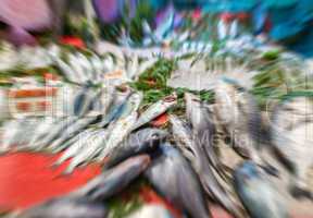 Blurred and zoomed picture of a fish market