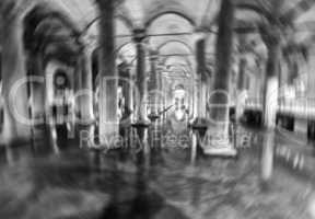 Blurred view of columns and arc in Yerebatan Saray in Istanbul
