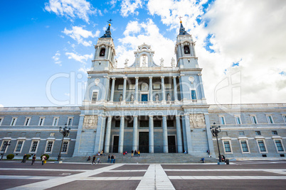 Royal palace with tourists on spring day in Madrid