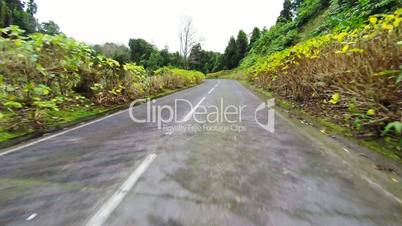 Fast Driving onto Curved Mountain Road on island Sao-Miguel, Azores