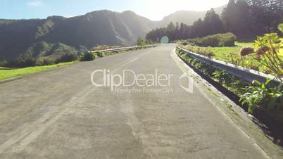 Fast Driving onto Curved Mountain Road on island Sao-Miguel, Azores