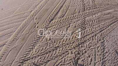 Many Footprints on Beach, aerial view from quadcopter