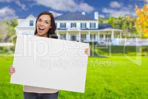 Mixed Race Female with Blank Sign In Front of House