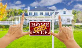 Hands Framing Sold For Sale Real Estate Sign and House