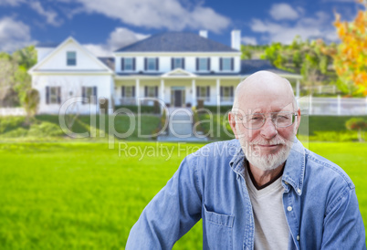 Senior Adult Man in Front of House