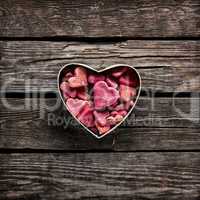 Open Heart Shaped Gift Box with Heap of Small Hearts