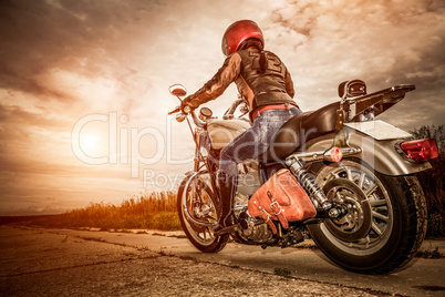 Biker girl on a motorcycle