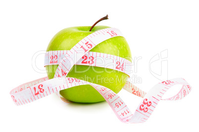 green apple and measure tape