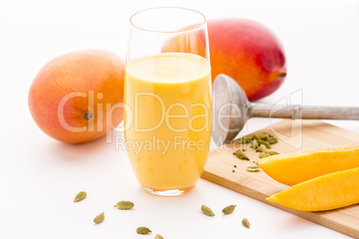 Mango Milkshake, Two Mangos And Fruit Slices