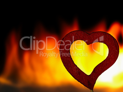 Flaming heart on a black background.