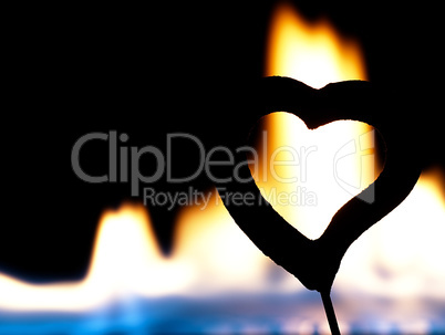 Flaming heart on a black background.