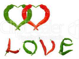 Two hearts and word Love composed of green and red chili peppers