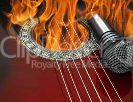 guitar and microphone burning in the fire