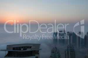 view foggy weather Dubai Marina at sunrise