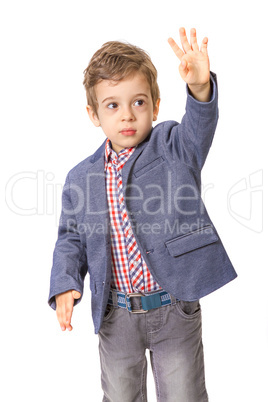 Little boy with with his hand lifted up
