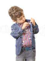 Little boy puts money in his pocket