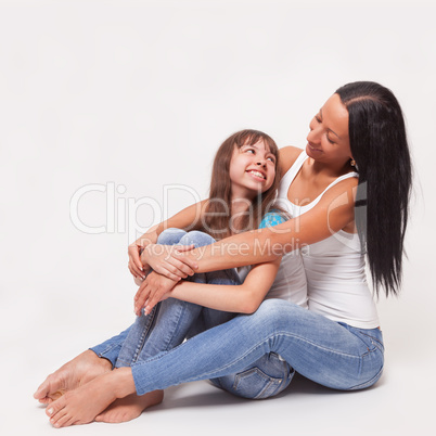 Portrait of a mother and daughter, family hug