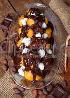 Chocolate profitteroles with cream