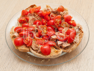Dried bread called freselle with tuna and tomatoes