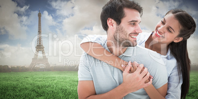 Composite image of cute couple smiling at each other