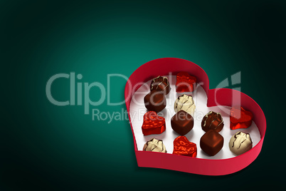 Composite image of heart shaped box of candy