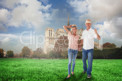 Composite image of happy couple walking holding hands