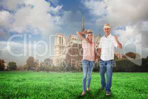 Composite image of happy couple walking holding hands