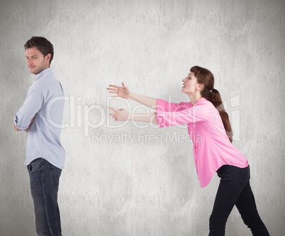 Composite image of woman trying to hug man