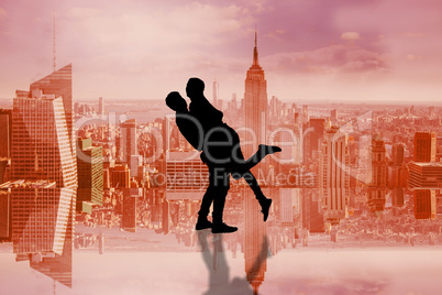 Composite image of attractive young couple hugging each other