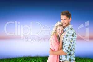 Composite image of attractive couple embracing and smiling at ca