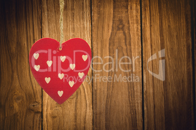 Composite image of cute heart decoration