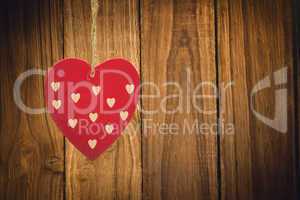 Composite image of cute heart decoration