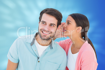 Composite image of brunette whispering secret to her boyfriend