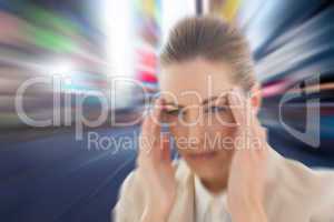 Composite image of woman with headache