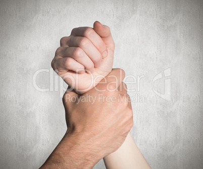 Composite image of womans wrist held by man