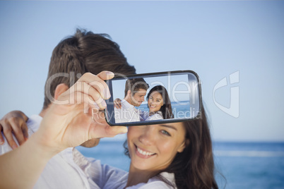 Couple taking selfie on smartphone