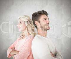 Composite image of attractive couple smiling with arms crossed