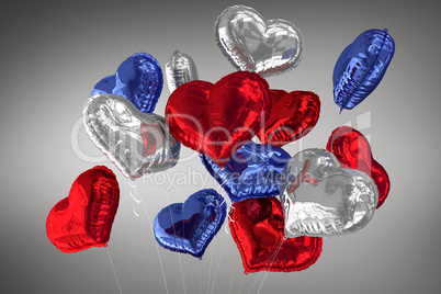 Composite image of heart balloons