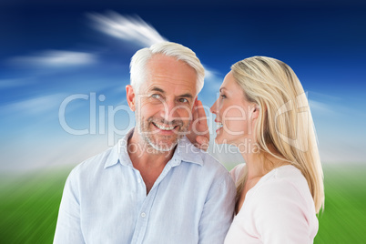 Composite image of woman whispering a secret to husband