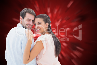 Composite image of attractive young couple smiling at camera