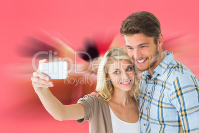 Composite image of attractive couple taking a selfie together