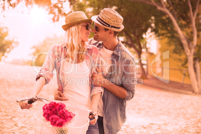 Hip young couple going for a bike ride